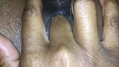 Masturbating