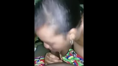 Ebony stepmom giving a sloppy  bj