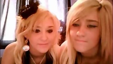 Two Hot Blonde Lesbians Play With Each Other On Cam