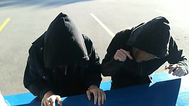 Two fags banging on a table