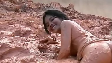 two thai girls in mud