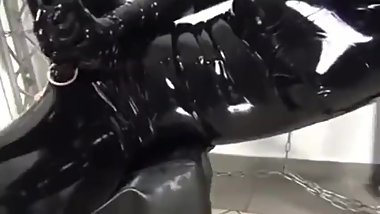 lesbian mastubed latex catsuit strapon