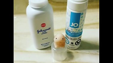 Autistic white girl tries to give a hand job to a micro penis dildo