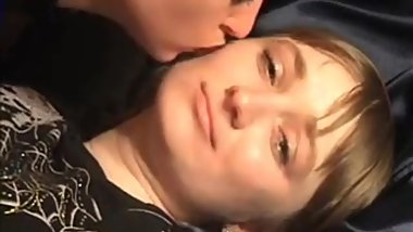 Girl tests lipstick on lesbian girlfriend