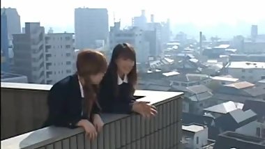 2 Lesbian Japanese student are kissing outside school