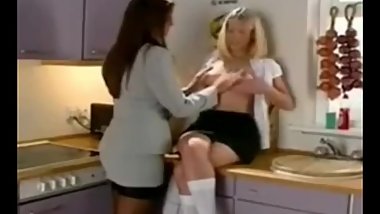 Sexy British MILF teaches little blonde schoolgirl lesbian sex