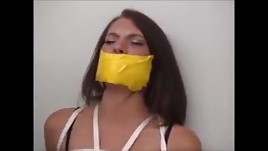 a girl tied by another