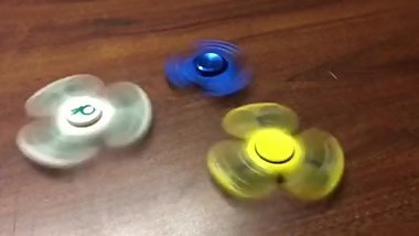 Lesbian fidget spinner threesome