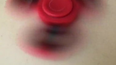 Amateur Fidget Spinner gets spun on the table