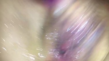 Brunette squirting listening to lesbian porn