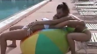 Lesbian beach ball play
