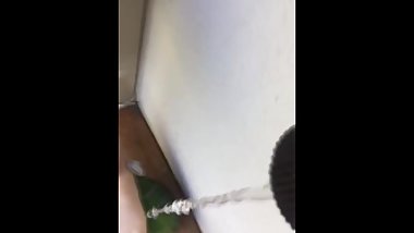 2 little girls play with their feet in watermelon and aggressively break it