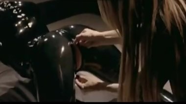 dominatrix latex lesbians going at it